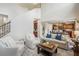 Bright living room boasts tall ceilings and open floor plan into the modern kitchen at 2710 Irwin Ct, Cumming, GA 30041