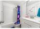 Cozy bathroom with a shower-tub combo, subway tile, and a modern vanity with a sink at 507 Lakeshore Dr, Stockbridge, GA 30281