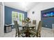Dining room featuring a modern fixture and seating for four at 507 Lakeshore Dr, Stockbridge, GA 30281