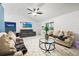 Bright living room features modern decor, including tiled floor and modern fixtures at 507 Lakeshore Dr, Stockbridge, GA 30281