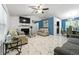 Open-concept living area with a fireplace and tile flooring at 507 Lakeshore Dr, Stockbridge, GA 30281