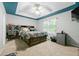 Spacious bedroom features a coffered ceiling, large window, and unique storage at 507 Lakeshore Dr, Stockbridge, GA 30281