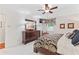 Well-lit bedroom showcasing a dresser with a large mirror, carpeted floors, and modern decor at 1405 Murdock Rd, Marietta, GA 30062
