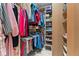 Walk-in closet equipped with ample shelving and hanging space for optimal storage at 1405 Murdock Rd, Marietta, GA 30062
