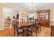 Formal dining room with hardwood floors, chandelier lighting and traditional furnishings at 1405 Murdock Rd, Marietta, GA 30062