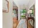 Inviting foyer with hardwood floors, a decorative runner and view to the front door and formal living spaces at 1405 Murdock Rd, Marietta, GA 30062