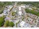 Expansive aerial shot showcasing the community's location near shops, restaurants, and green spaces at 160 Fowler St # 100, Woodstock, GA 30188