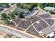 Aerial shot of a concert in a large outdoor space with seating, trees and surrounding buildings at 160 Fowler St # 100, Woodstock, GA 30188