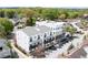 Modern three-story building with balconies, parking, and close proximity to the town square at 160 Fowler St # 100, Woodstock, GA 30188