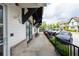 Exterior shot showcasing a sidewalk lined with shrubbery, providing sidewalk access at 160 Fowler St # 100, Woodstock, GA 30188