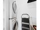 Modern, stacked washer and dryer set, with a convenient step ladder for easy access at 160 Fowler St # 100, Woodstock, GA 30188