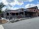 Inviting outdoor dining area with covered seating at MadLife Stage & Studios at 160 Fowler St # 100, Woodstock, GA 30188