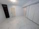 This room features white floors, a built-in bookshelf and a closet for ample storage space at 1939 Suwanee Valley Rd, Lawrenceville, GA 30043
