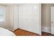 Spacious bedroom closet with built-in storage and a window for natural light at 2178 Tanglewood Rd, Decatur, GA 30033