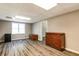 Basement with wood-look flooring, cabinets, natural light and neutral walls at 349 Harris Loop, Dallas, GA 30157