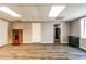 Basement with vinyl plank flooring, mini refrigerator, neutral walls and access to other rooms at 349 Harris Loop, Dallas, GA 30157
