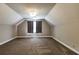 Upstairs bedroom with carpeting and a window at 349 Harris Loop, Dallas, GA 30157