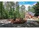 Inviting exterior with a circular driveway and an elegant brick facade at 349 Harris Loop, Dallas, GA 30157