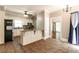 Eat-in kitchen featuring an island and stainless steel appliances at 349 Harris Loop, Dallas, GA 30157