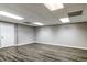 Living room with wood floors and a white door at 349 Harris Loop, Dallas, GA 30157