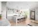 Bright kitchen with custom cabinets, marble countertops, a large island, and stainless steel appliances at 134 Woodlawn Ave, Decatur, GA 30030