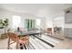 Bright and airy living room with large windows, hardwood floors, and comfortable seating at 134 Woodlawn Ave, Decatur, GA 30030
