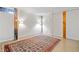 Spacious bedroom featuring a large rug, exposed beams, and lots of space at 170 Boulevard Se # E414, Atlanta, GA 30312