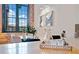 Bright dining area featuring an industrial-style window and stylish decor at 170 Boulevard Se # E414, Atlanta, GA 30312