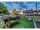 Exterior view featuring a foosball table, chairs, and lush greenery with industrial architecture in the background at 170 Boulevard Se # E414, Atlanta, GA 30312
