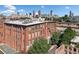 Exterior building view featuring the cityscape and brick architecture at 170 Boulevard Se # E414, Atlanta, GA 30312