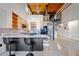 Modern kitchen with an island, quartz countertop, and spiral staircase access at 170 Boulevard Se # E414, Atlanta, GA 30312