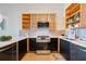 Updated kitchen with modern appliances, bright countertop, and ample cabinet space at 170 Boulevard Se # E414, Atlanta, GA 30312