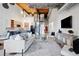 Bright living room featuring an open floor plan, modern decor, and spiral staircase to the upper level at 170 Boulevard Se # E414, Atlanta, GA 30312