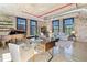 Bright living room boasts exposed brick walls, large windows, and a piano for a touch of sophistication and charm at 170 Boulevard Se # E414, Atlanta, GA 30312
