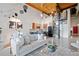 Spacious living room with high ceilings, open layout, modern kitchen, and spiral staircase at 170 Boulevard Se # E414, Atlanta, GA 30312