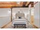 Comfortable main bedroom with high wood ceilings, bedside tables, and patterned rug at 170 Boulevard Se # E414, Atlanta, GA 30312