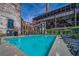 Outdoor pool area with lounge chairs, greenery, and architectural features, ideal for relaxation and recreation at 170 Boulevard Se # E414, Atlanta, GA 30312