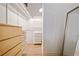 Walk-in closet with custom shelving and ample storage space, including a dresser at 170 Boulevard Se # E414, Atlanta, GA 30312