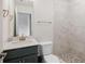 Bathroom featuring tile floors, tile walk-in shower, modern toilet and fixtures at 2215 Nena Way # 20, Tucker, GA 30084