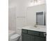 Bathroom featuring tile walls, a marble counter top, and chrome fixtures at 2215 Nena Way # 20, Tucker, GA 30084