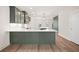 Spacious kitchen features a large island, stainless appliances, and stylish design elements at 2215 Nena Way # 20, Tucker, GA 30084