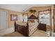 Bedroom with neutral walls, carpet floors, and natural lighting at 238 Diamond Valley Pass, Canton, GA 30114