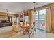 Cozy breakfast nook with a dining table, a sliding glass door to the patio, and a view of the backyard at 238 Diamond Valley Pass, Canton, GA 30114