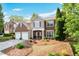 Beautiful two-story home with brick accents, a well-kept lawn, and a two-car garage at 238 Diamond Valley Pass, Canton, GA 30114
