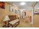 Bright, carpeted hallway with decorative lighting and wall decor at 238 Diamond Valley Pass, Canton, GA 30114