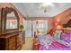 Comfortable main bedroom with a large dresser and a view into the bathroom at 238 Diamond Valley Pass, Canton, GA 30114