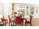 Well-lit kitchen and dining area with stainless steel appliances, granite counters, and stylish decor at 555 Letchas Ln, Alpharetta, GA 30009