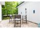 Inviting patio with brick pavers and outdoor seating, perfect for relaxing or entertaining at 555 Letchas Ln, Alpharetta, GA 30009