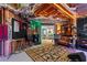 Finished basement with a music studio set up, including instruments and recording equipment in a cozy setting at 5885 Wild Azalea Cv, Sugar Hill, GA 30518
