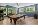 Game room featuring a pool table with natural light and arcade game at 5885 Wild Azalea Cv, Sugar Hill, GA 30518